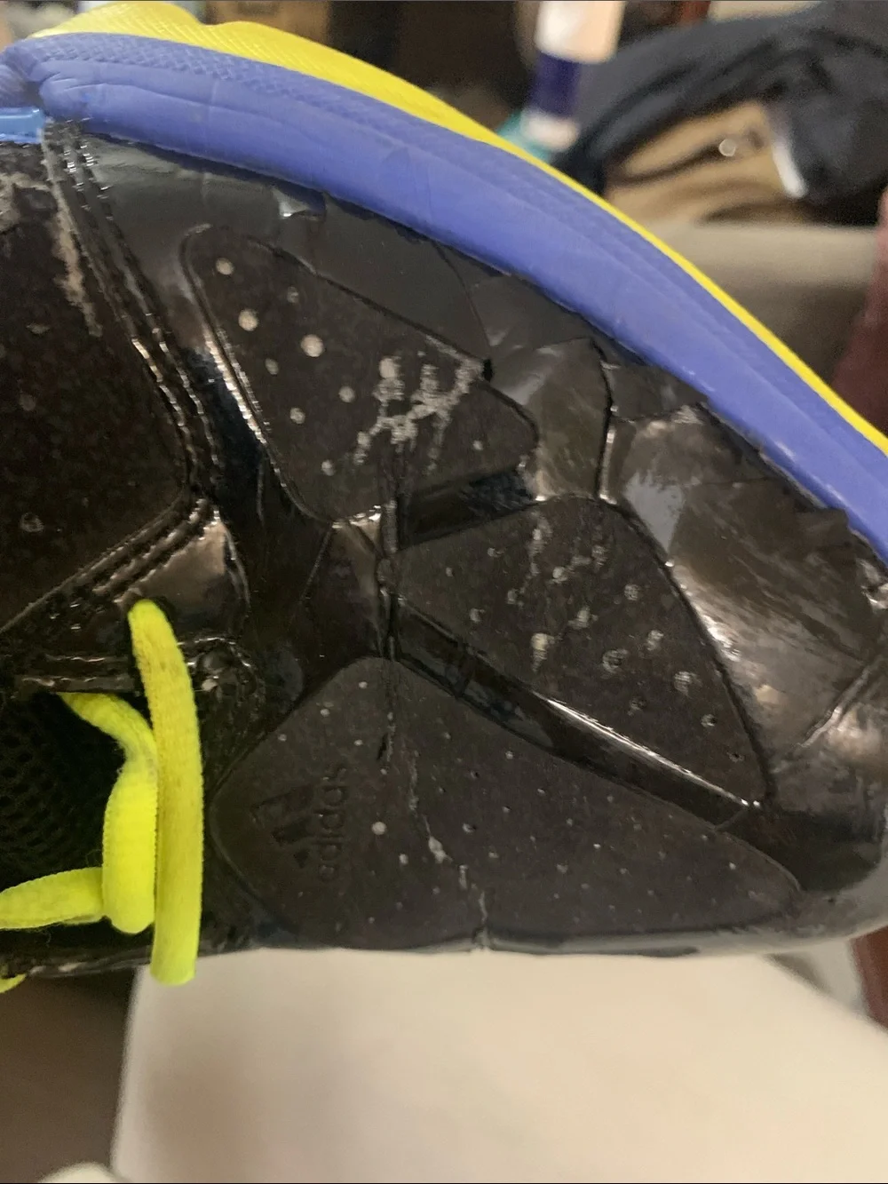 Black and Blue High-Top Athletic Shoes with Neon Yellow Laces